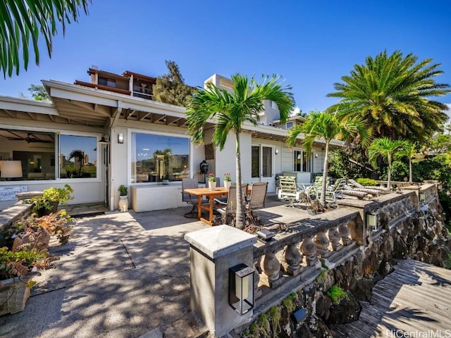 back of house featuring a patio