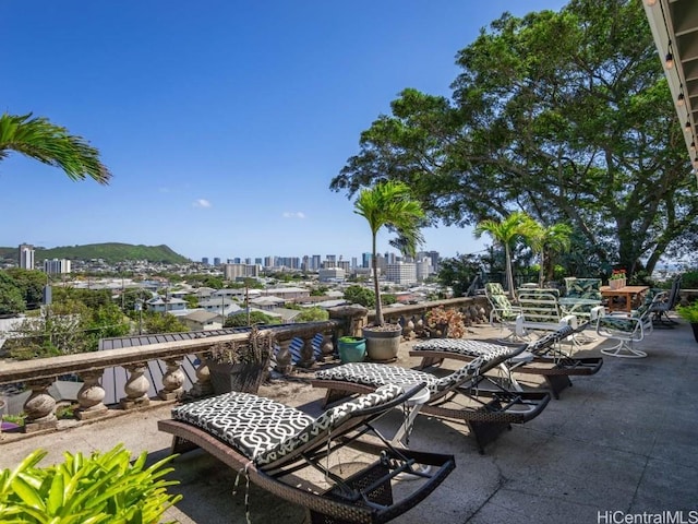 view of patio / terrace featuring a mountain view