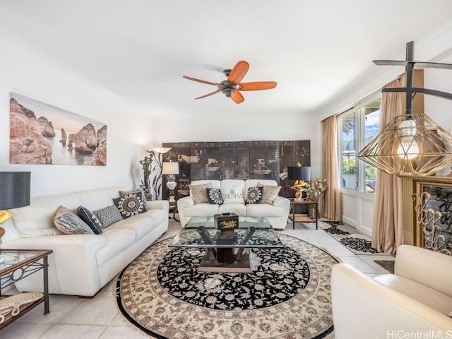 tiled living room with crown molding and ceiling fan