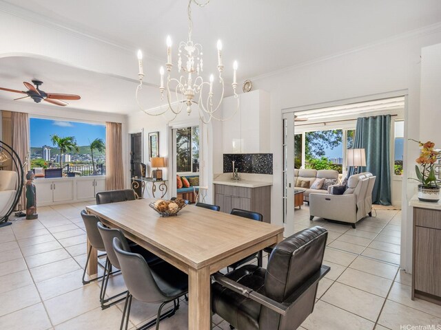 654 N Judd St Unit 654, Honolulu, HI 96817 - dining space featuring light tile patterned floors, a ceiling fan, a chandelier, and ornamental molding