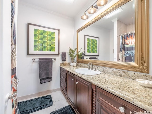 bathroom with tile patterned floors, walk in shower, vanity, and ornamental molding