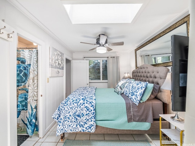 654 N Judd St Unit 654, Honolulu, HI 96817 - tiled bedroom with crown molding, a skylight, multiple windows, and a ceiling fan