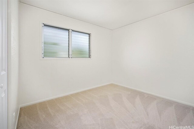 unfurnished room with carpet