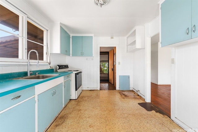 kitchen with white range with electric cooktop, a wealth of natural light, sink, and light hardwood / wood-style floors