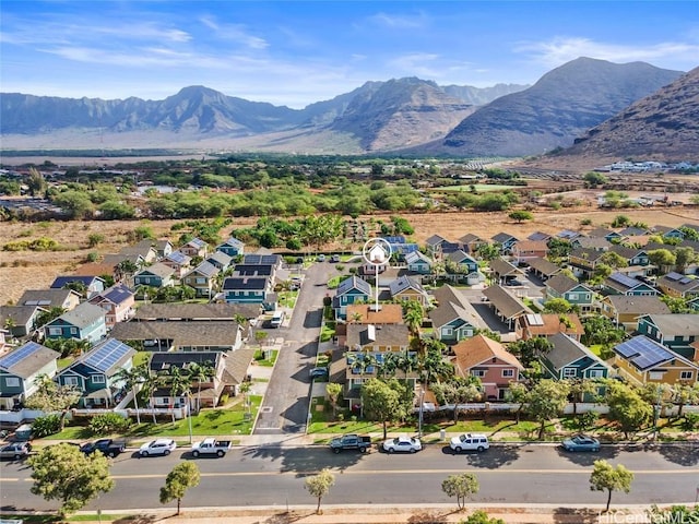 birds eye view of property featuring a mountain view