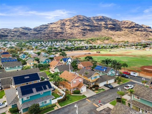 birds eye view of property featuring a mountain view