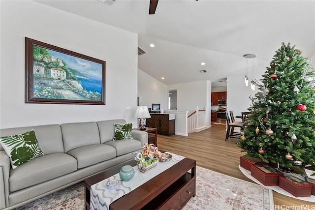 living room with light hardwood / wood-style flooring