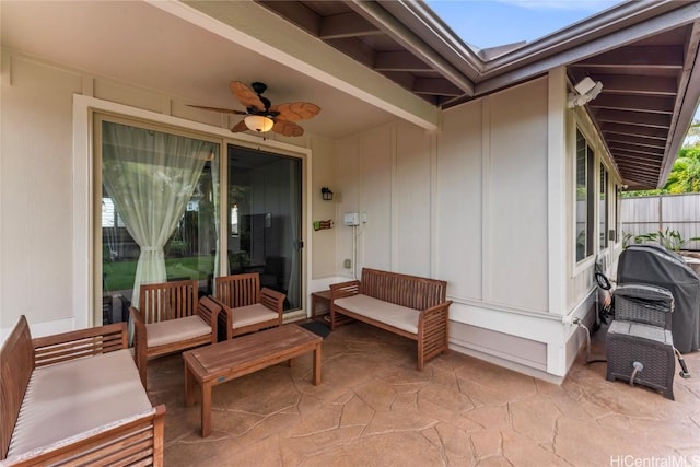 view of patio / terrace with grilling area, ceiling fan, and outdoor lounge area