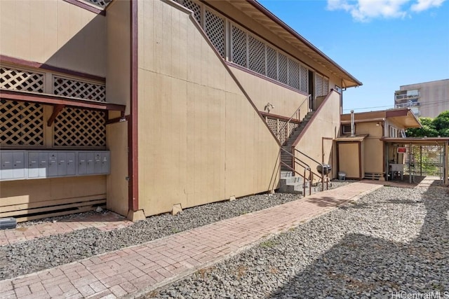 view of property exterior with mail boxes