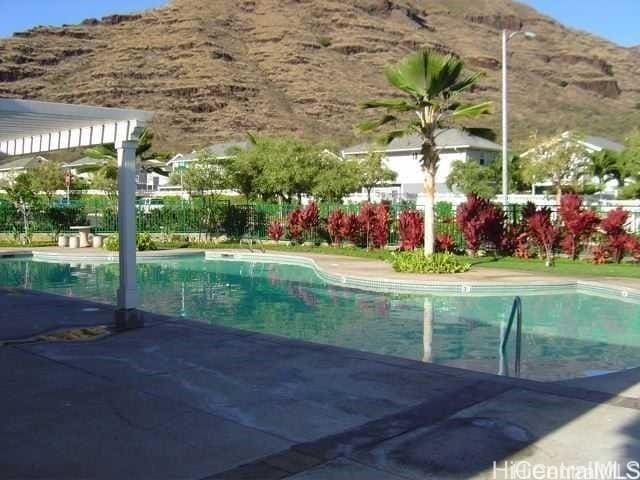 view of pool with a mountain view