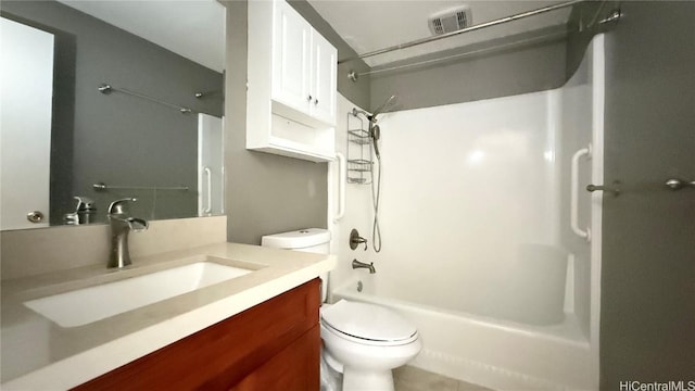 full bathroom with vanity, bathtub / shower combination, and toilet