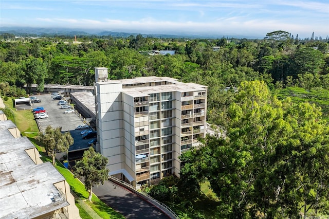95-2031 Waikalani Pl Unit D906, Mililani, HI 96789 - view of apartment building / complex featuring a view of trees