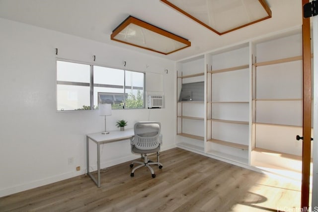 office space with light hardwood / wood-style flooring