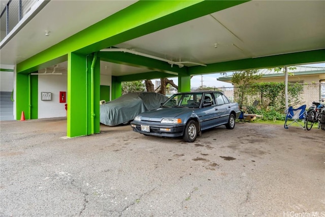 view of car parking featuring a carport