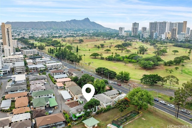 birds eye view of property featuring a mountain view