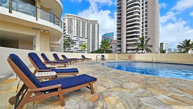 view of pool with a patio area