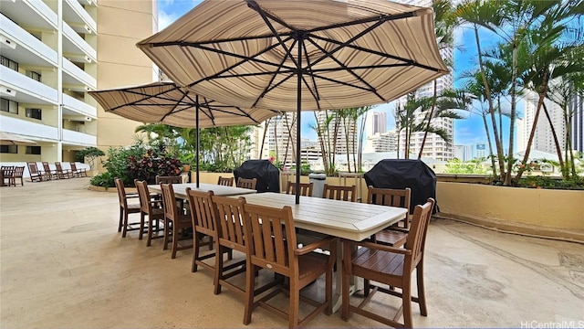 view of patio featuring a grill