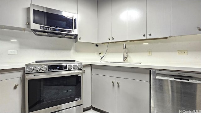 kitchen with sink and stainless steel appliances