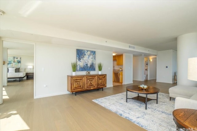 living room featuring light wood-type flooring