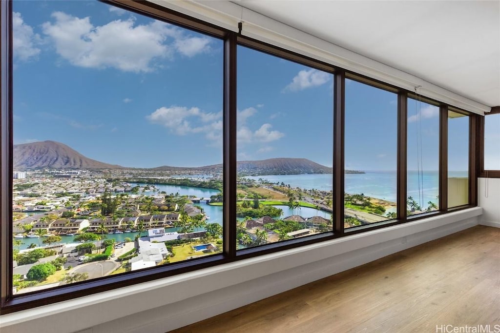 interior space featuring a water and mountain view