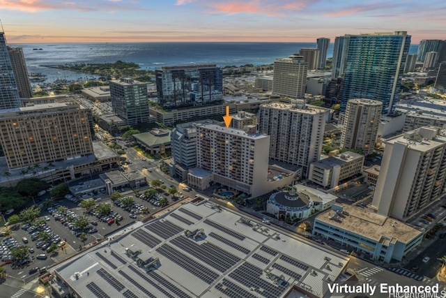 aerial view at dusk with a water view