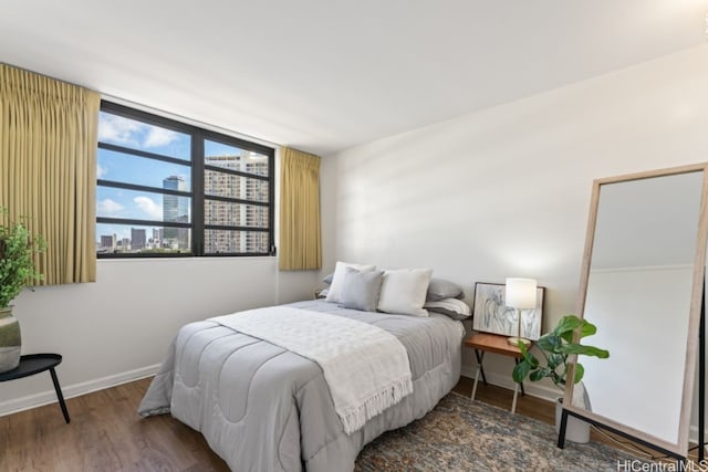 bedroom featuring dark hardwood / wood-style floors