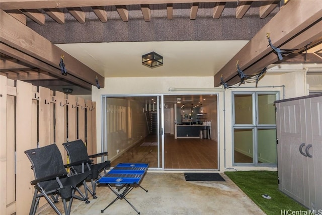 doorway to property featuring a patio