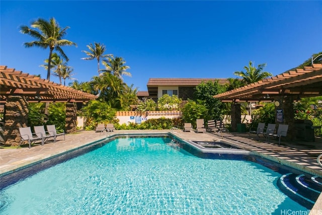 view of pool featuring a patio area and a pergola