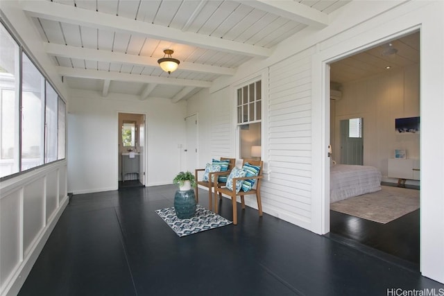 sunroom / solarium with beam ceiling