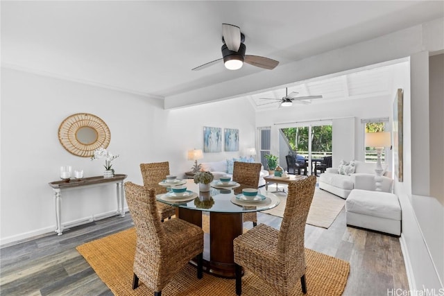 dining area featuring hardwood / wood-style floors and ceiling fan