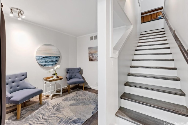 stairs with hardwood / wood-style flooring