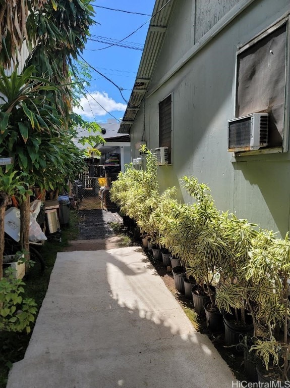 view of home's exterior with cooling unit