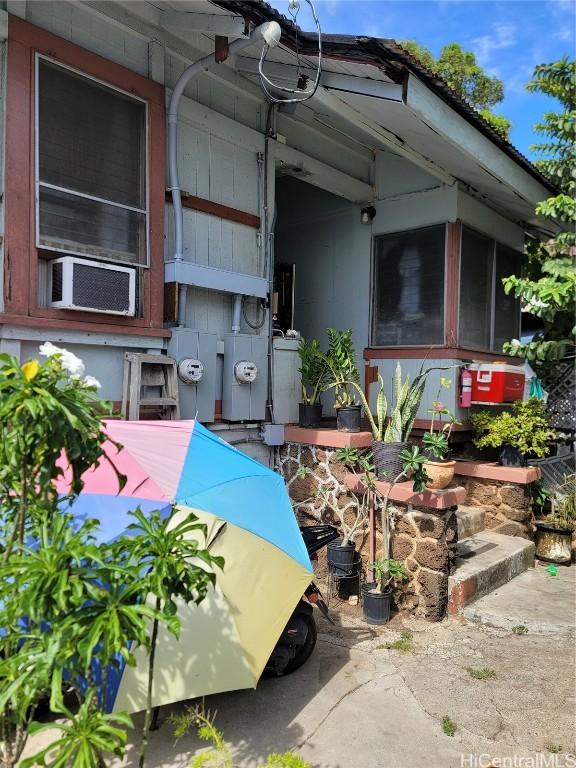 view of patio featuring a sunroom