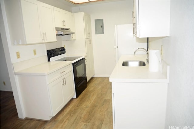 kitchen featuring electric panel, electric range oven, light wood-style flooring, under cabinet range hood, and a sink