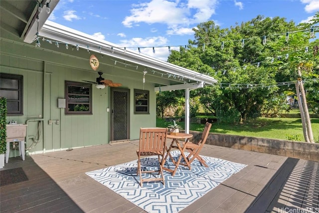 view of patio / terrace featuring ceiling fan and a deck