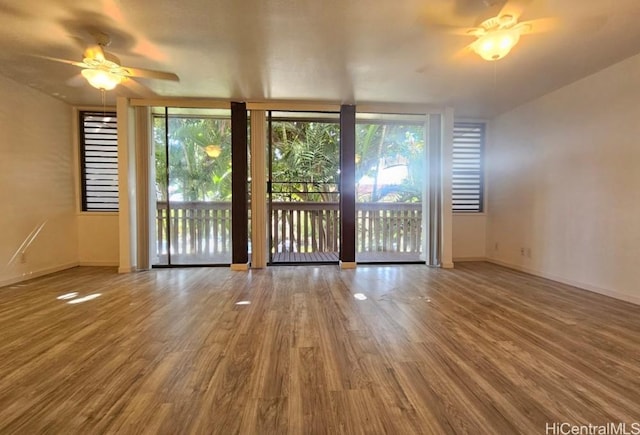 84-754 Ala Mahiku St Unit 52A, Waianae, HI 96792 - empty room featuring hardwood / wood-style flooring and ceiling fan