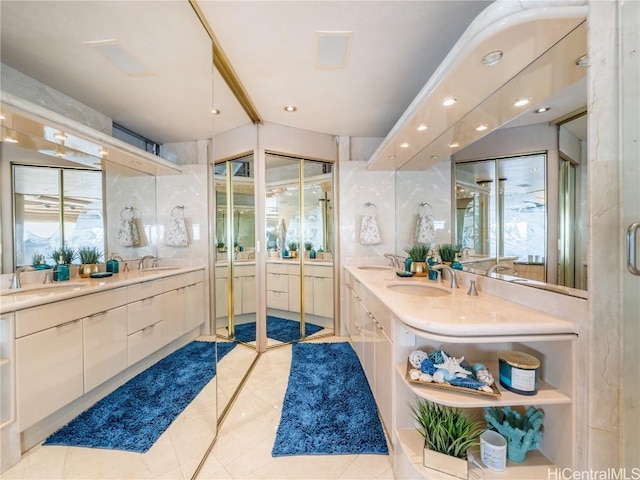 bathroom with tile patterned floors and vanity