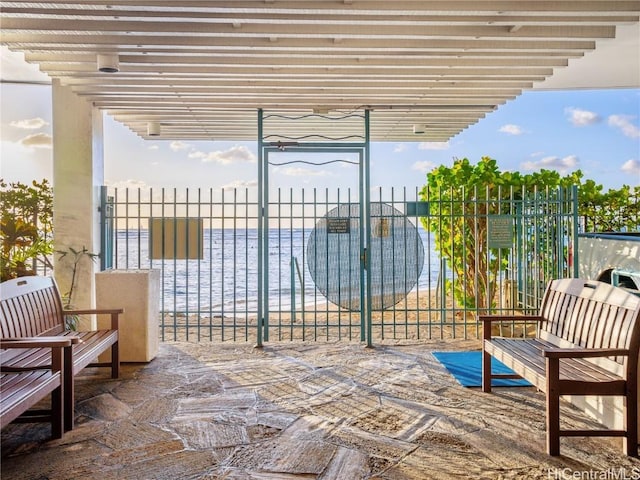 view of patio / terrace with a water view