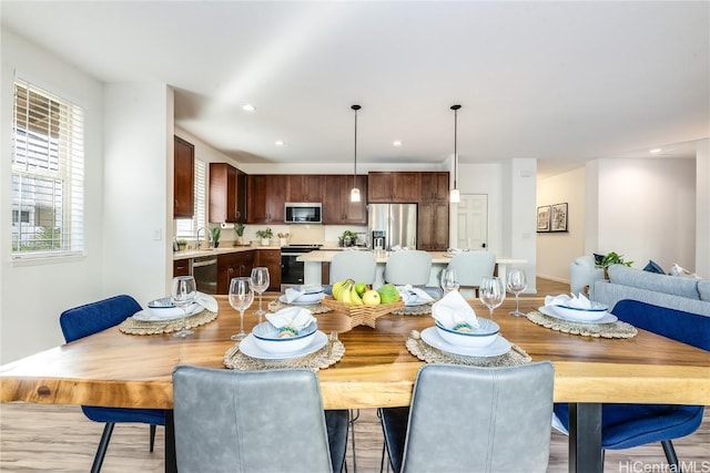 dining area featuring light hardwood / wood-style flooring