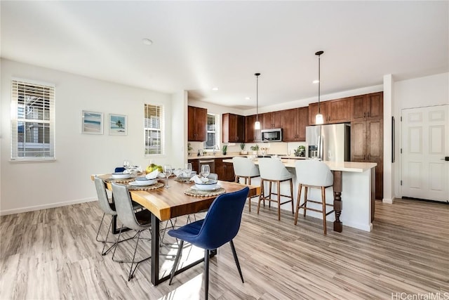 dining area featuring light hardwood / wood-style flooring