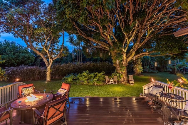 dock area featuring a wooden deck and a yard