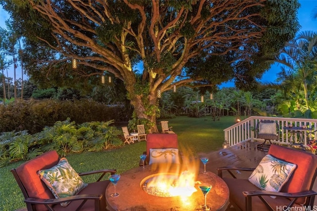 view of patio / terrace with an outdoor fire pit