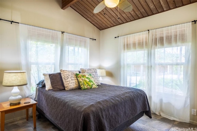 bedroom with ceiling fan, wood ceiling, and vaulted ceiling with beams