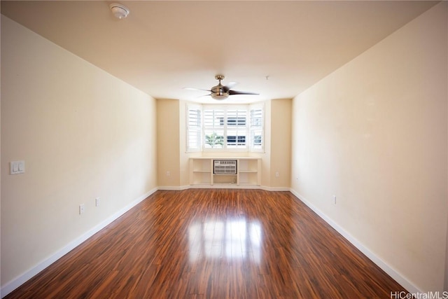 unfurnished living room featuring a wall mounted AC, ceiling fan, and dark wood-type flooring