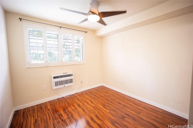 spare room featuring hardwood / wood-style flooring, ceiling fan, a wall mounted air conditioner, and heating unit