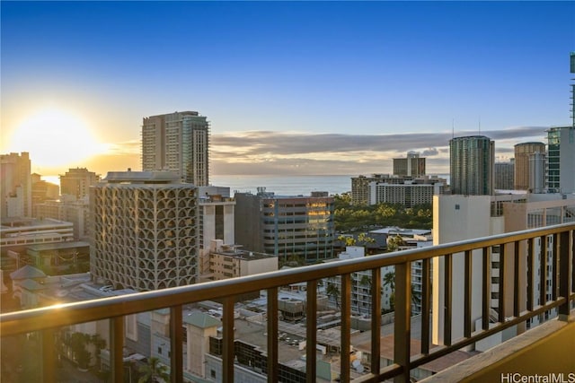 balcony at dusk with a water view