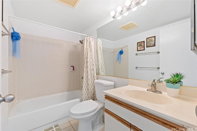 full bathroom featuring toilet, vanity, tile patterned floors, and shower / bath combo with shower curtain