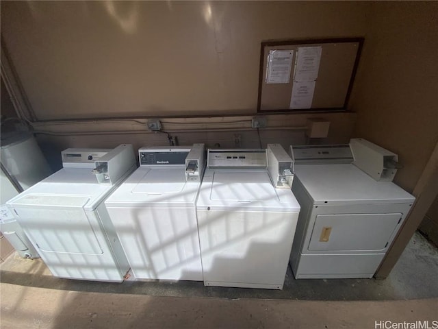 laundry room with independent washer and dryer