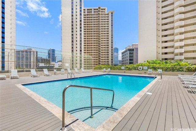 view of swimming pool with a patio