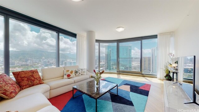 living room featuring expansive windows